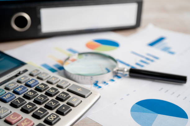 Binder data finance report business with graph analysis in office.